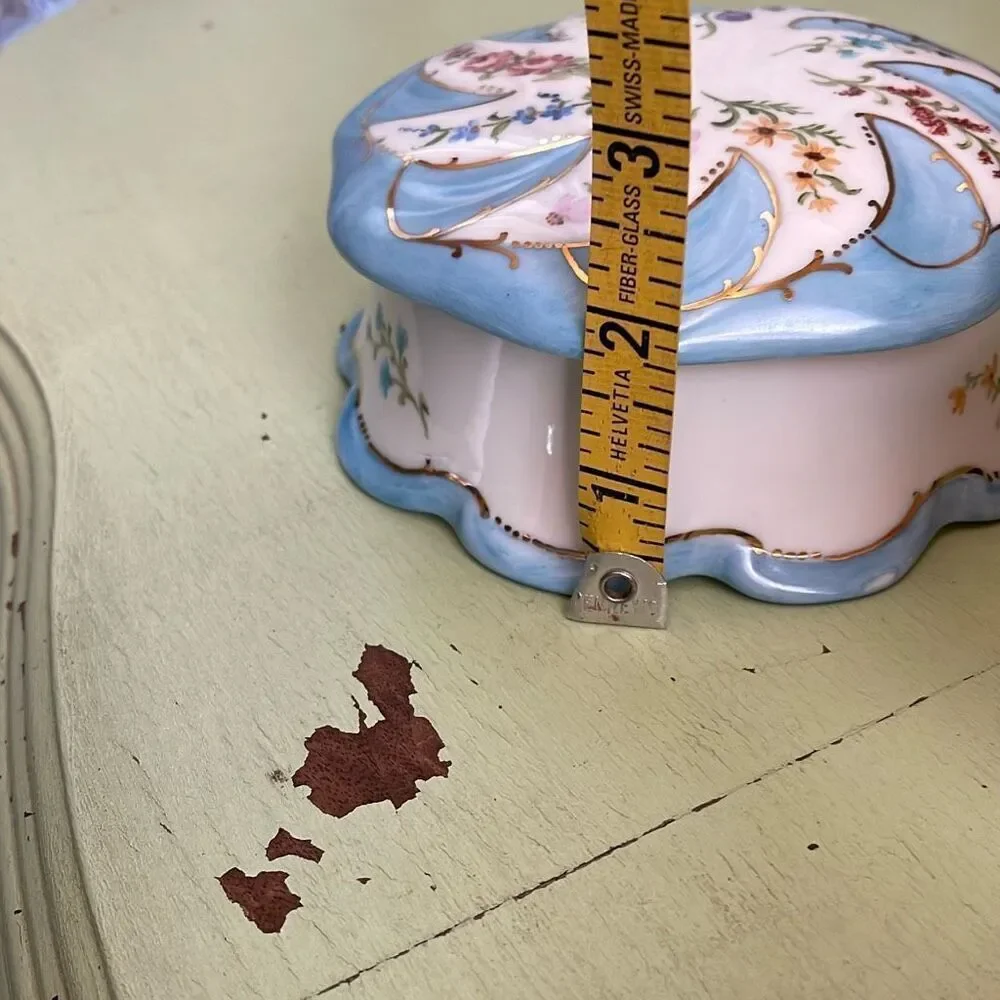 Vintage hand painted porcelain trinket box  by Jeanette Wriedt .